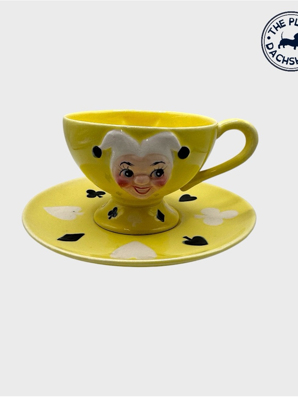 Vintage Kreiss Yellow Joker Face Teacup and Saucer